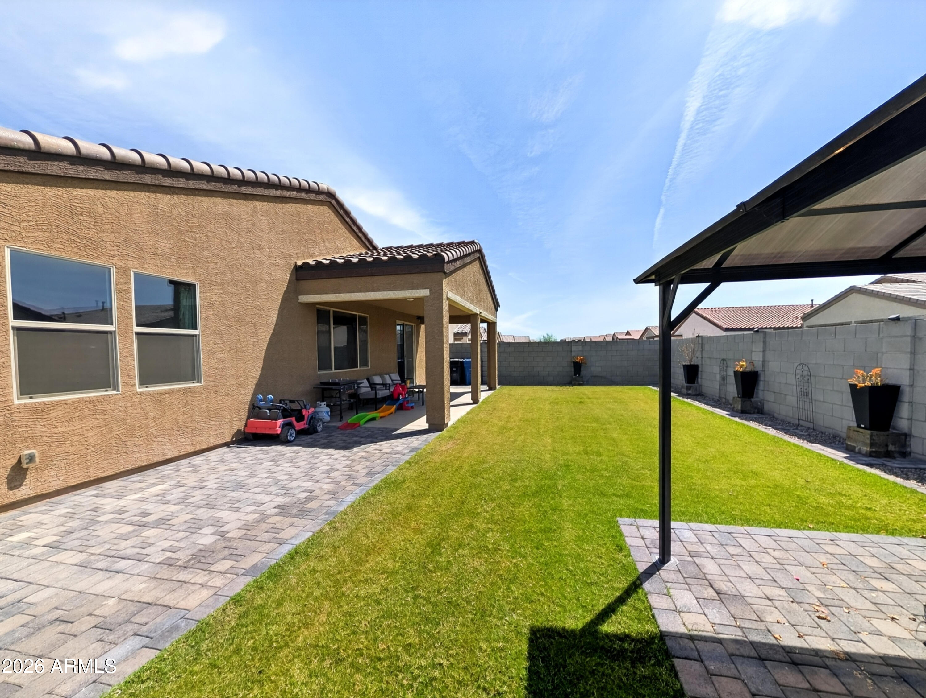 2439 West Pecan Road Phoenix, AZ 85041 - Photo 23 of 38 a view of a house with swimming pool