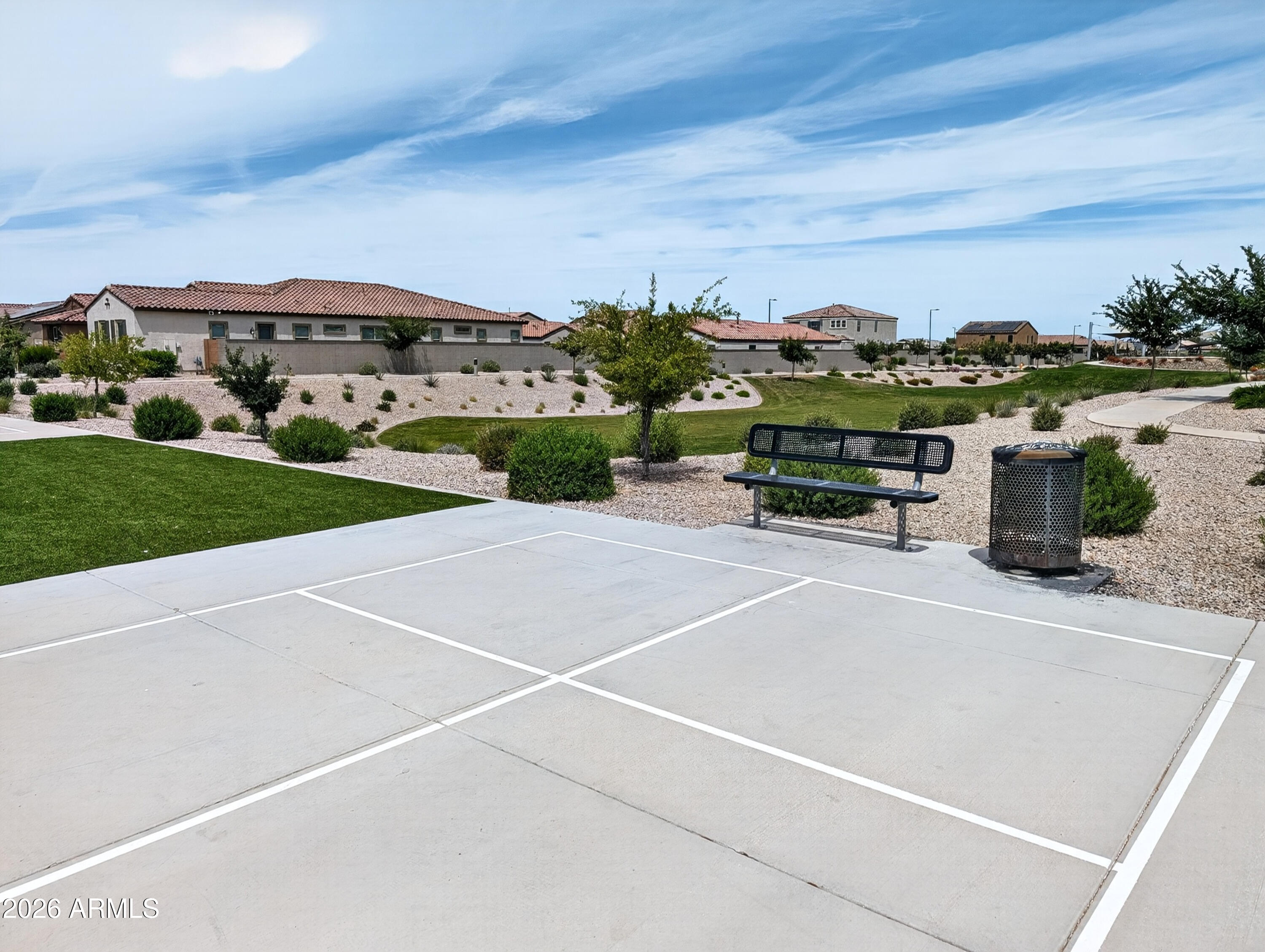 2439 West Pecan Road Phoenix, AZ 85041 - Photo 28 of 38 a terrace with a bench and trees