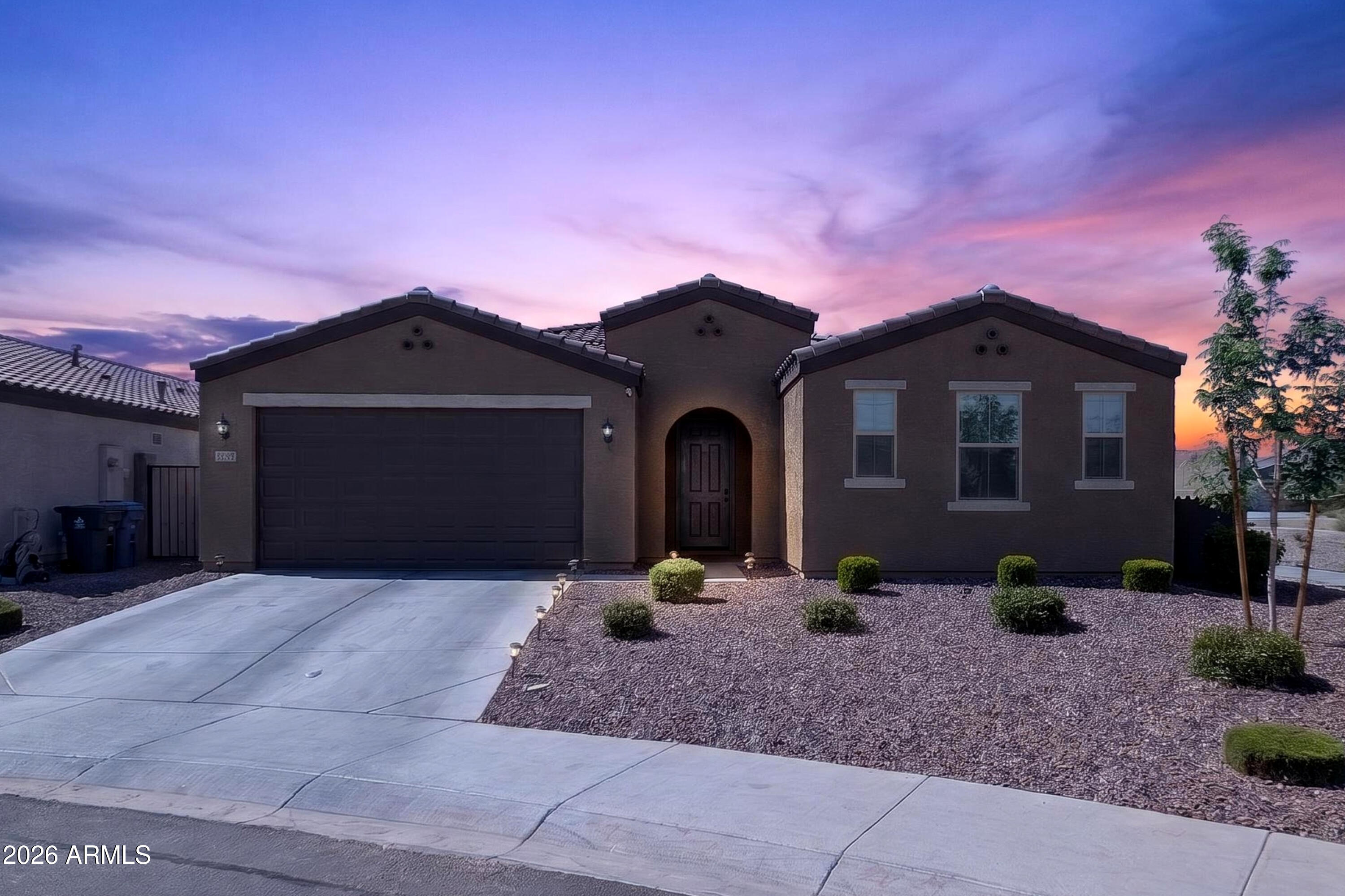 2439 West Pecan Road Phoenix, AZ 85041 - Photo 34 of 38 a front view of a house with a yard