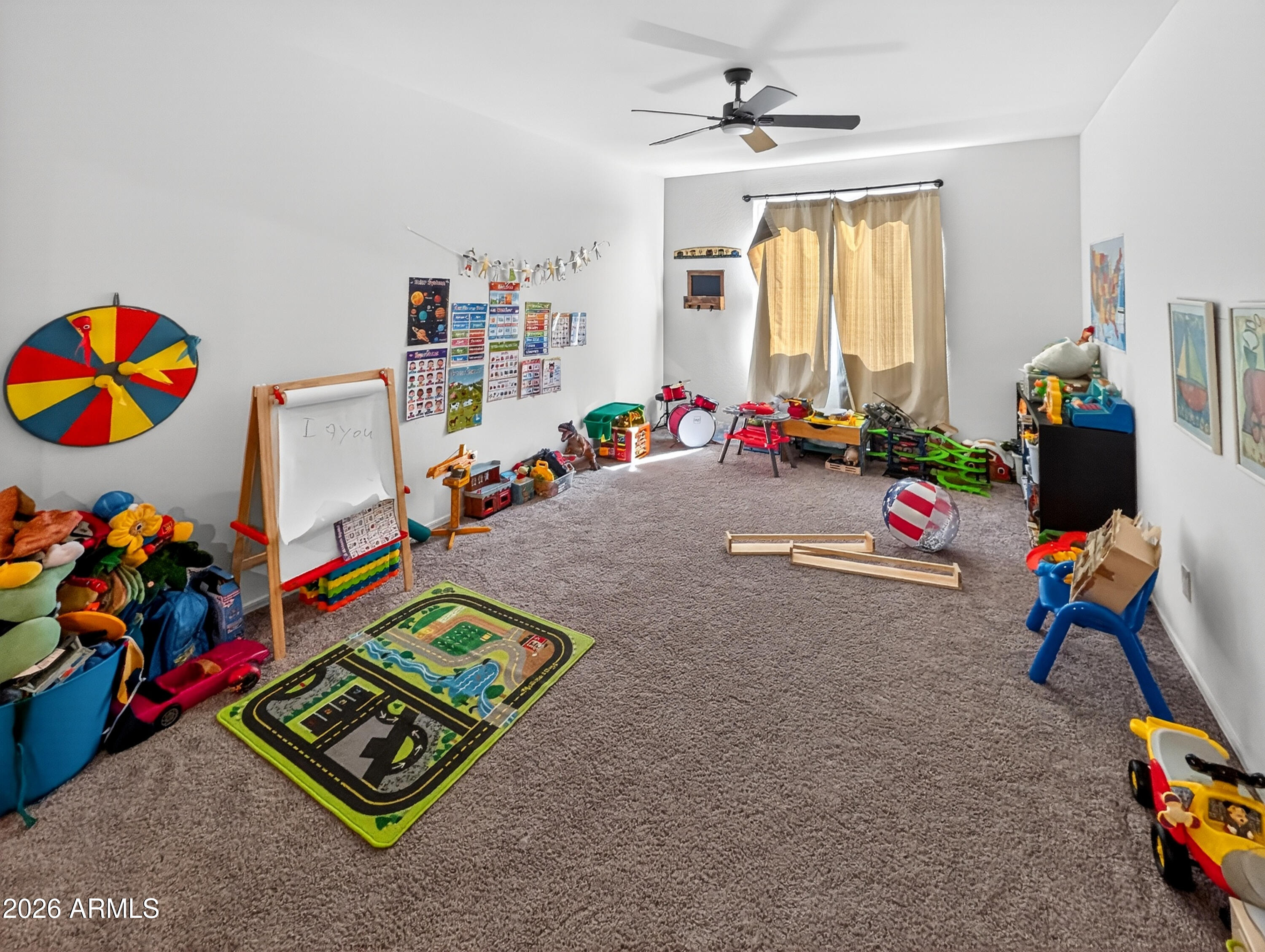 2439 West Pecan Road Phoenix, AZ 85041 - Photo 6 of 38 a children room with toys and toys