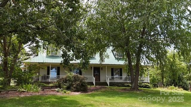 4462-1 Hoover Road Lawndale, NC 28090 - Photo 2 of 38 a front view of house with a garden