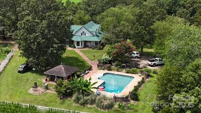 4462-1 Hoover Road Lawndale, NC 28090 - Photo 3 of 38 an aerial view of a house with swimming pool and outdoor seating