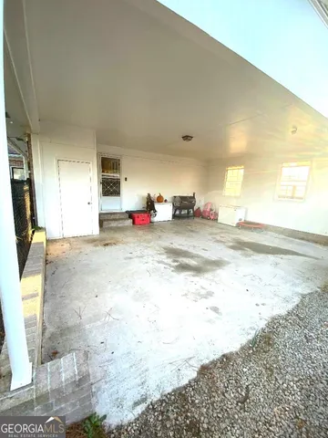 a view of a living room and a sink