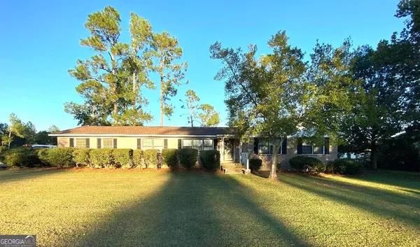 a view of a house with a swimming pool