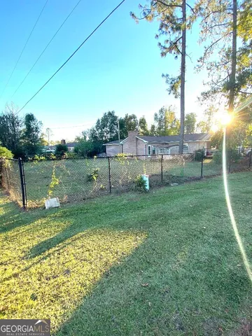 a view of a park with a slide