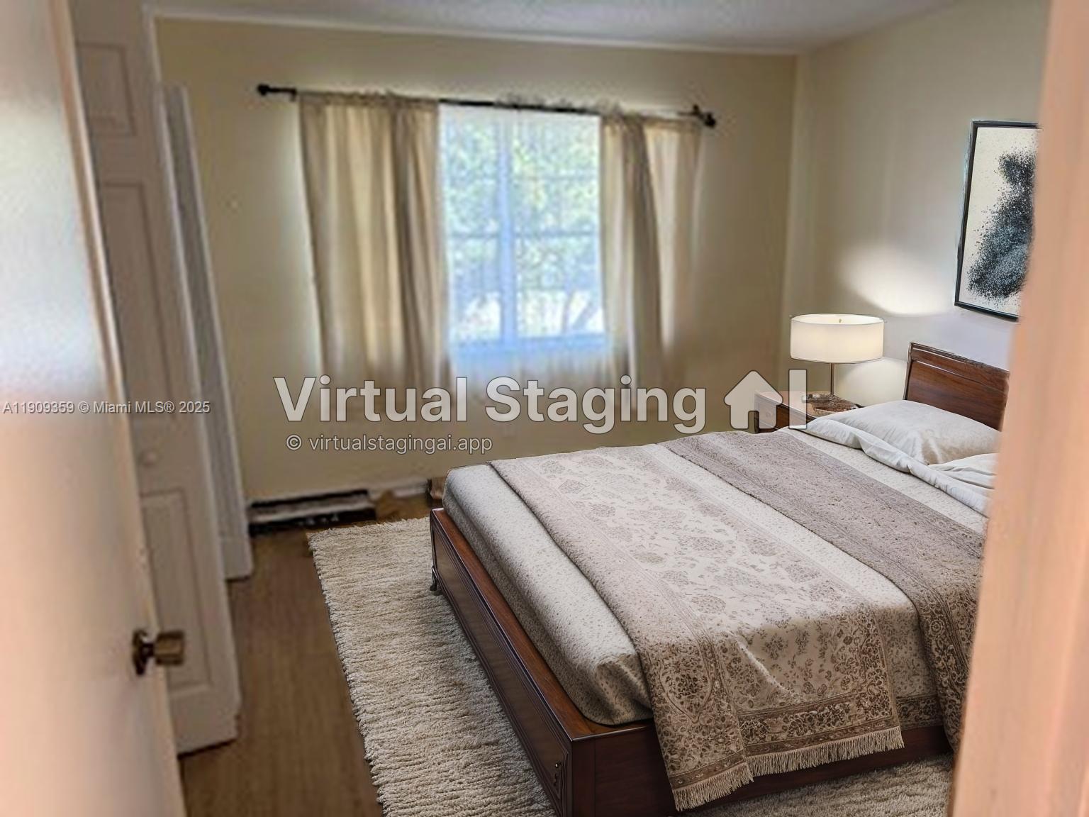 8411 Northwest 8th Street, Unit 203 Miami, FL 33126 - Photo 2 of 11 a bedroom with a bed and a window