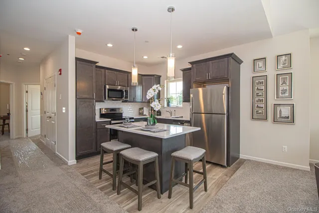 a kitchen with granite countertop a sink and counter space