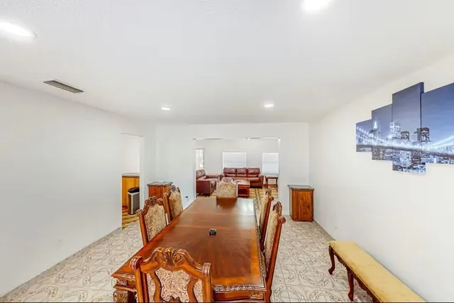 a view of a dining room with furniture