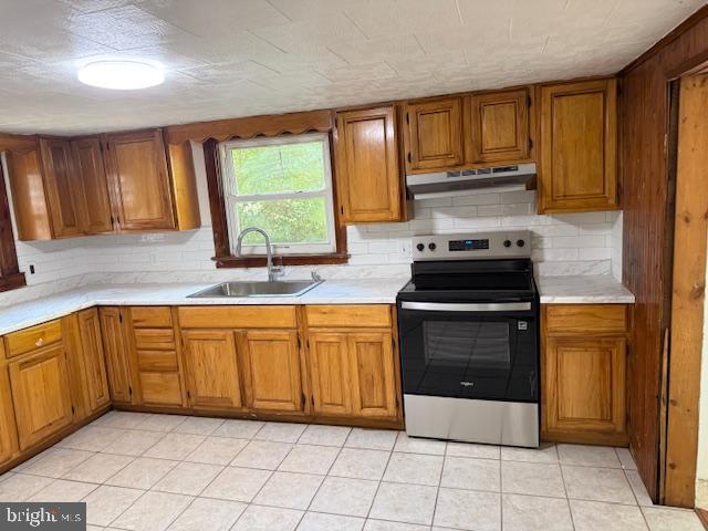 2 Hogback Road Trenton, NJ 08620 - Photo 4 of 12 a kitchen with stainless steel appliances granite countertop a stove a sink and a microwave
