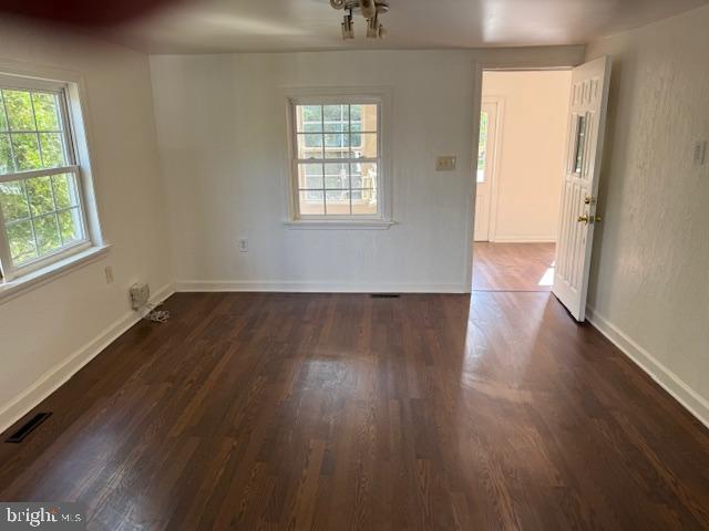 2 Hogback Road Trenton, NJ 08620 - Photo 5 of 12 an empty room with wooden floor and windows