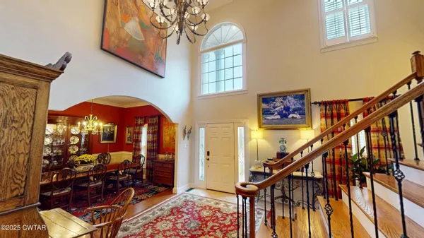 a view of entryway livingroom and hall
