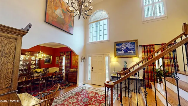 a view of entryway livingroom and hall