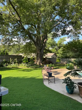 a chair and table with garden view