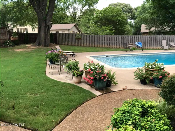 a garden view with a seating space