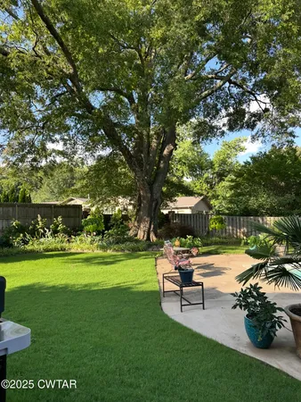 a garden view with a sitting space
