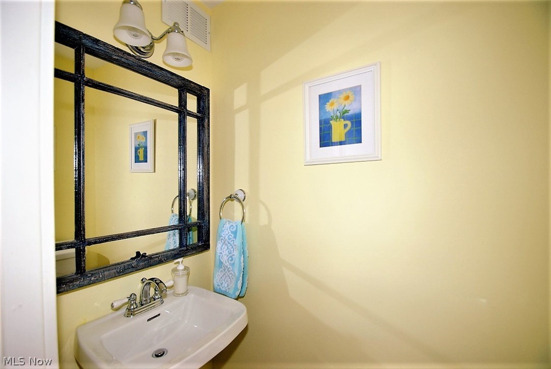 2464 Fenwick Road Cleveland, OH 44118 - Photo 13 of 23 POWDER ROOM LOCATED OFF BREAKFAST ROOM