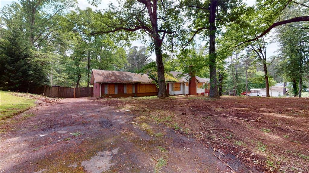 2482 Ben Hill Road East Point, GA 30344 - Photo 1 of 1 a view of a house with a yard