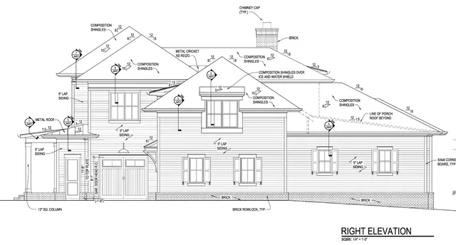 a black and white photo of a living room