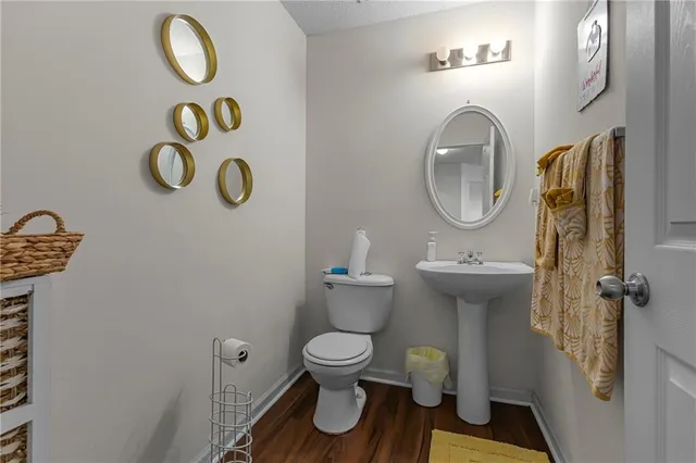 a bathroom with a toilet and a sink