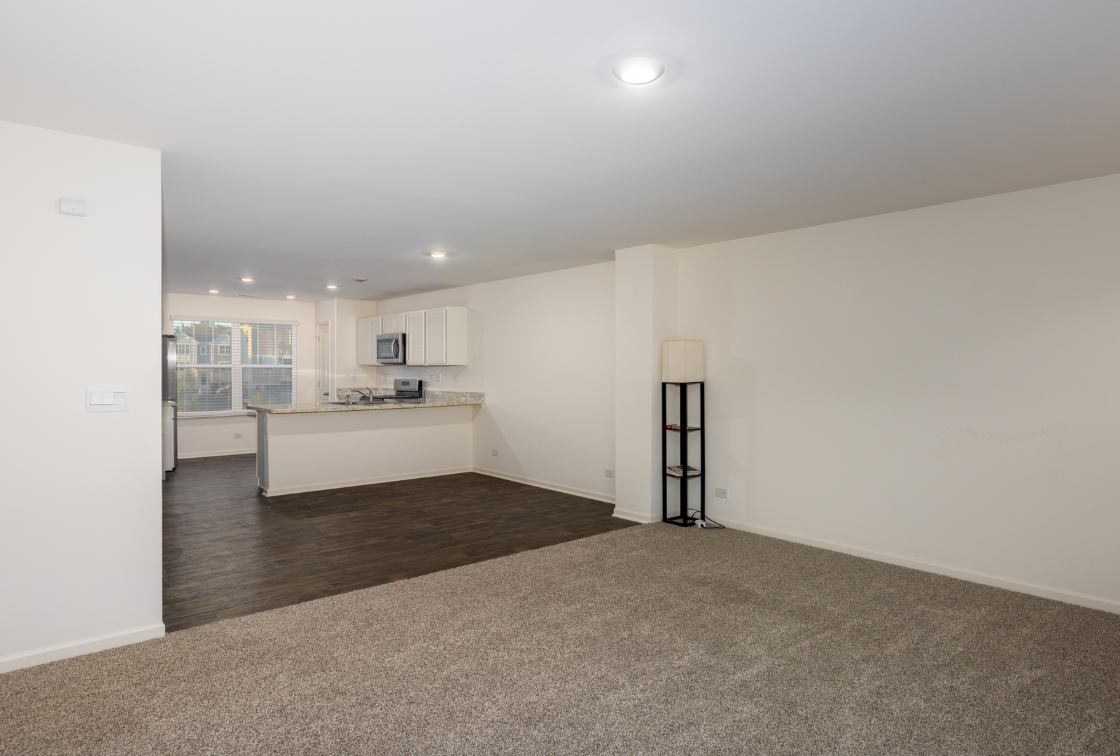 3831 Currant Lane Elgin, IL 60124 - Photo 5 of 19 a view of a kitchen with a sink and cabinets