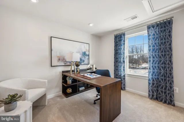 a room with furniture and window