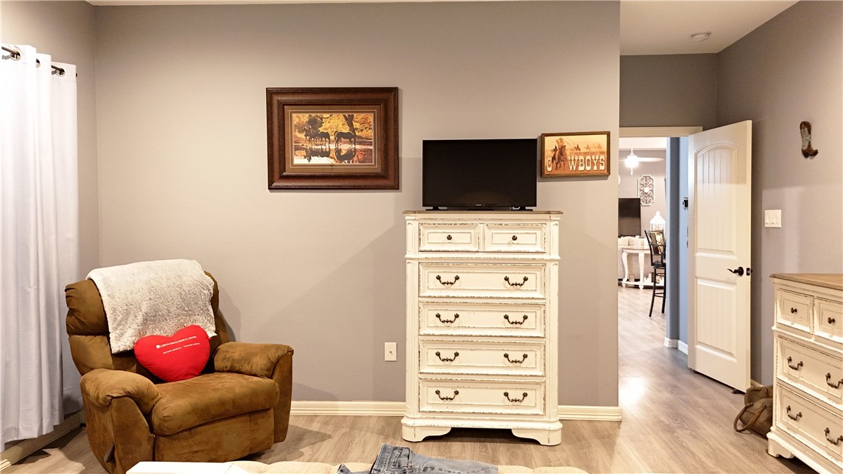 570 County Road 137 Alice, TX 78332 - Photo 17 of 30 a living room with furniture and a flat screen tv