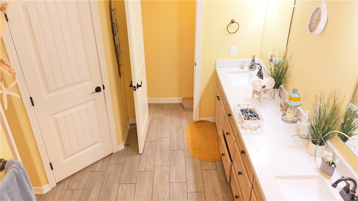 570 County Road 137 Alice, TX 78332 - Photo 20 of 30 a bed room with a bed and a couch