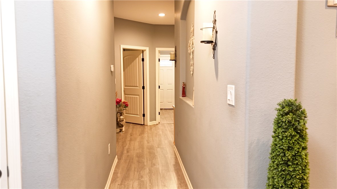 570 County Road 137 Alice, TX 78332 - Photo 23 of 30 a view of a bathroom with a shower curtain