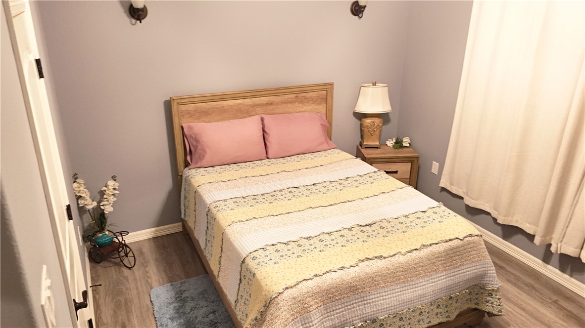 570 County Road 137 Alice, TX 78332 - Photo 24 of 30 a bedroom with a bed and a mirror