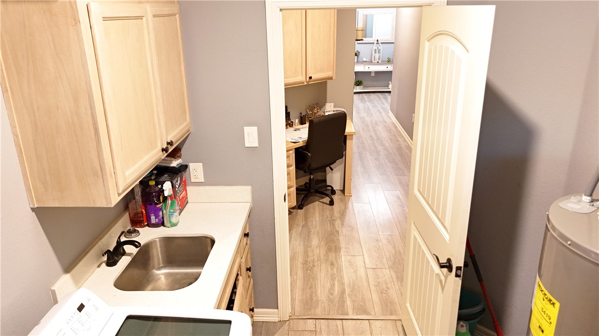 570 County Road 137 Alice, TX 78332 - Photo 29 of 30 a bathroom with a sink and a mirror
