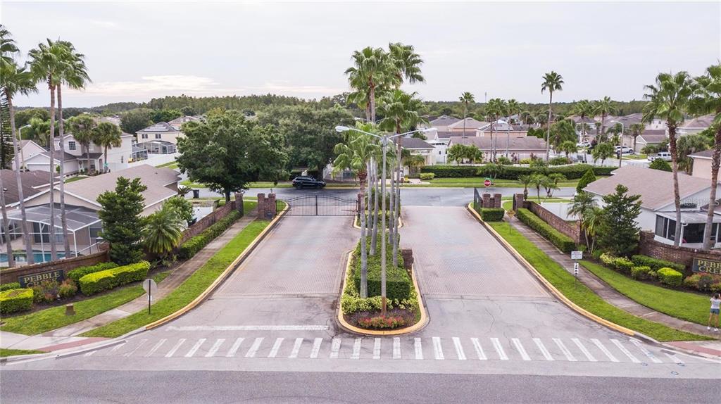 1112 Timberbend Circle Orlando, FL 32824 - Photo 15 of 32 a view of a swimming pool with a patio
