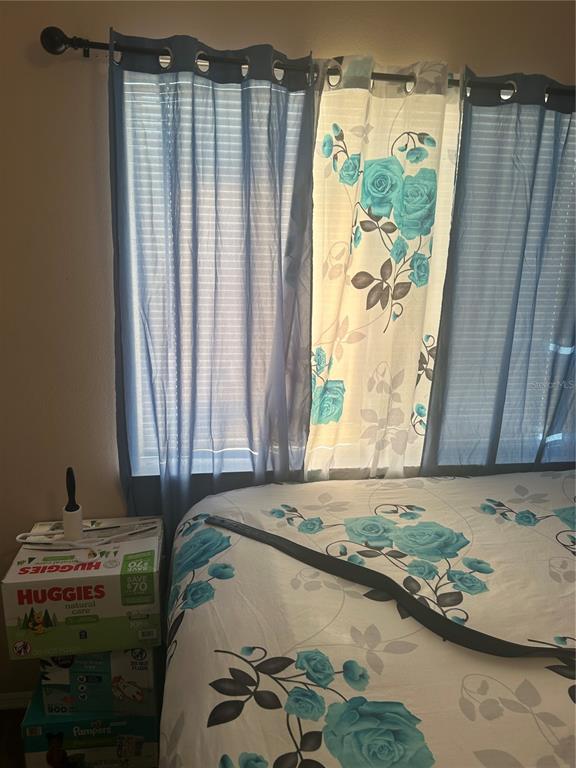 1112 Timberbend Circle Orlando, FL 32824 - Photo 7 of 32 a bathroom with a granite countertop sink and a mirror