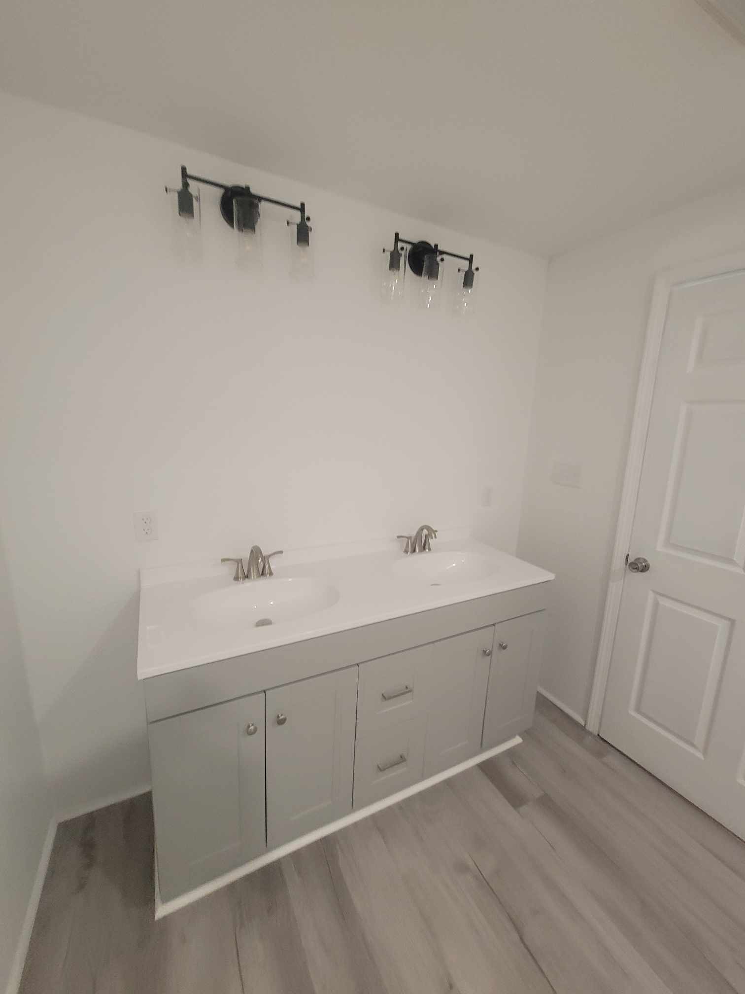 363 Enigma Road Chestnut Mound, TN 38552 - Photo 20 of 60 a room with a sink and mirror