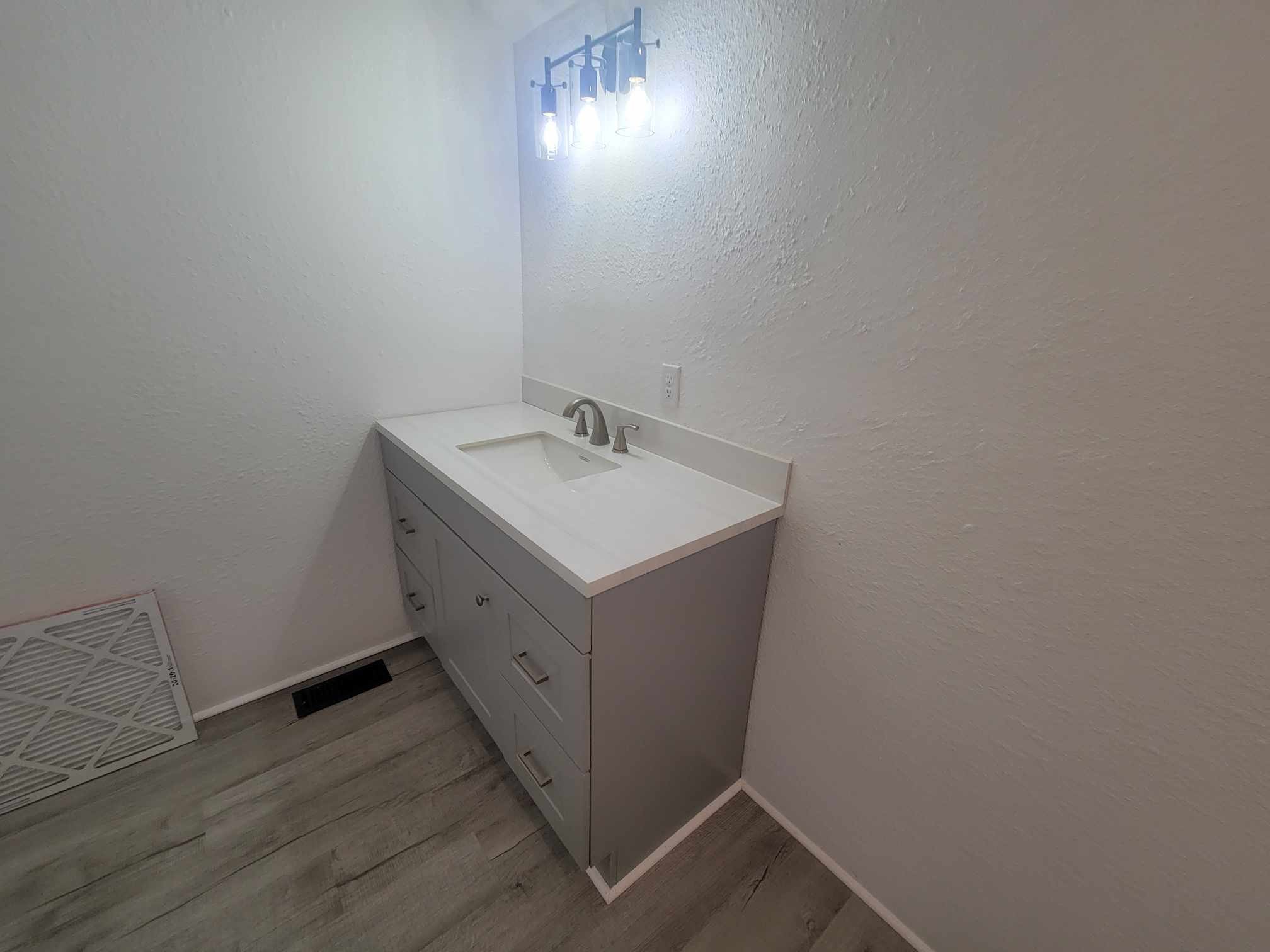 363 Enigma Road Chestnut Mound, TN 38552 - Photo 23 of 60 a bathroom with a sink and a mirror