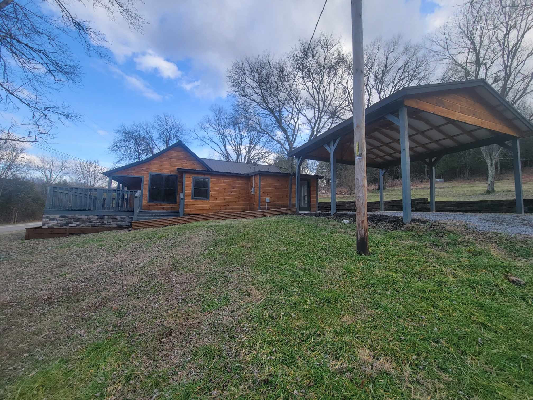 363 Enigma Road Chestnut Mound, TN 38552 - Photo 44 of 60 a front view of a house with a garden