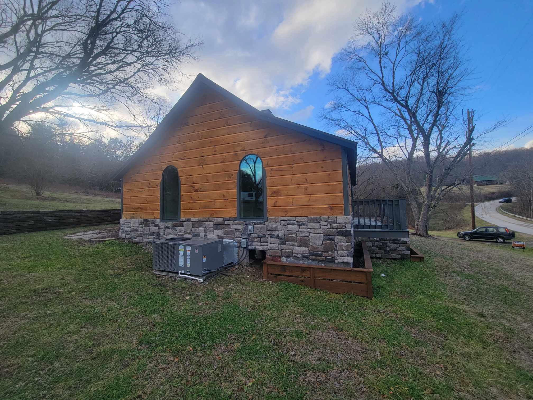 363 Enigma Road Chestnut Mound, TN 38552 - Photo 53 of 60 a front view of a house with garden