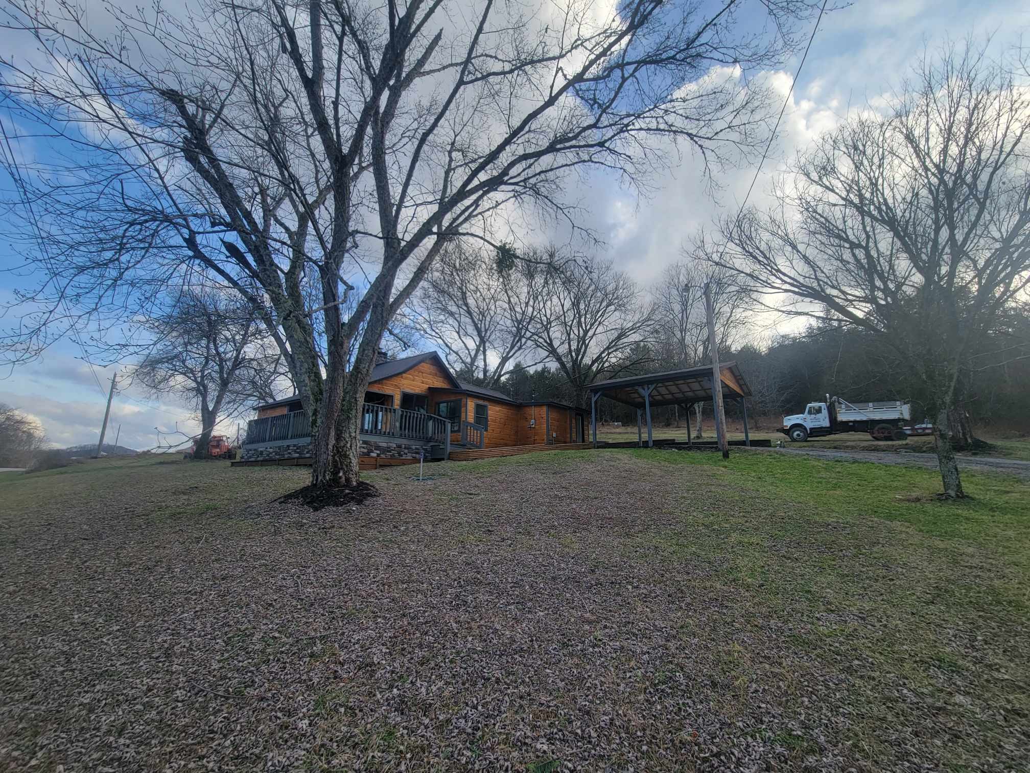 363 Enigma Road Chestnut Mound, TN 38552 - Photo 56 of 60 a view of a house with a yard