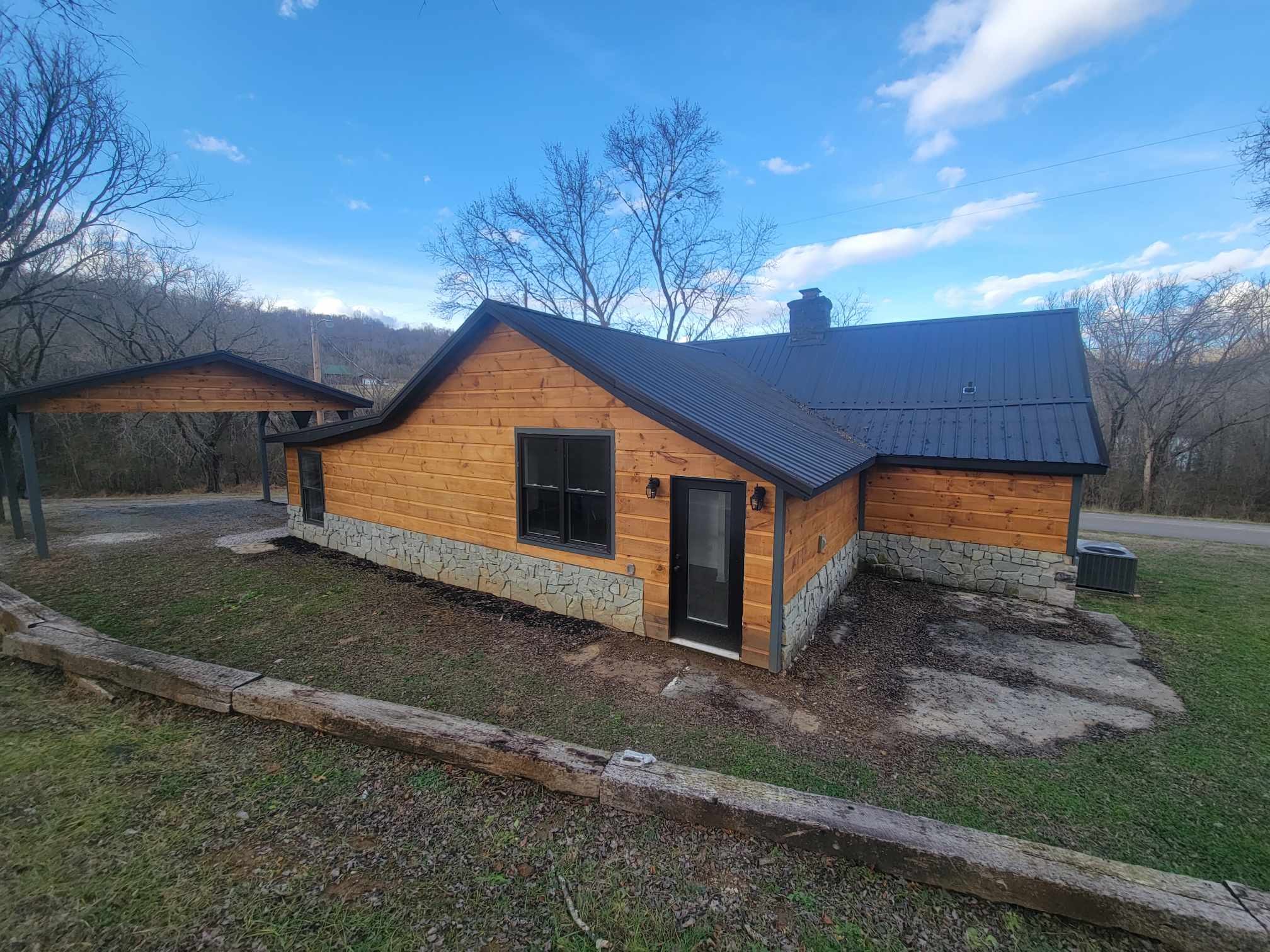 363 Enigma Road Chestnut Mound, TN 38552 - Photo 59 of 60 a backyard of a house with wooden fence