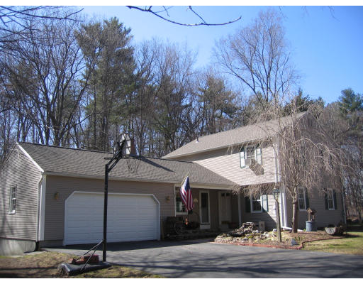 9 Russell Road Wilbraham, MA 01095 - Photo 1 of 12 a front view of a house with garden