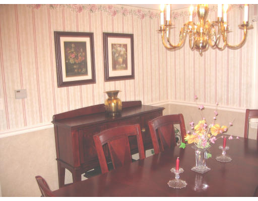 9 Russell Road Wilbraham, MA 01095 - Photo 6 of 12 a front view of a house with a table