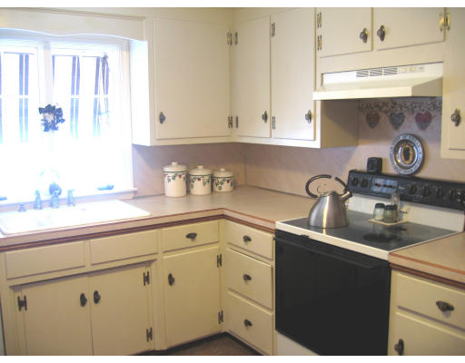 9 Russell Road Wilbraham, MA 01095 - Photo 8 of 12 a kitchen with cabinets and window