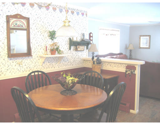 9 Russell Road Wilbraham, MA 01095 - Photo 10 of 12 a dining room with furniture and wooden floor