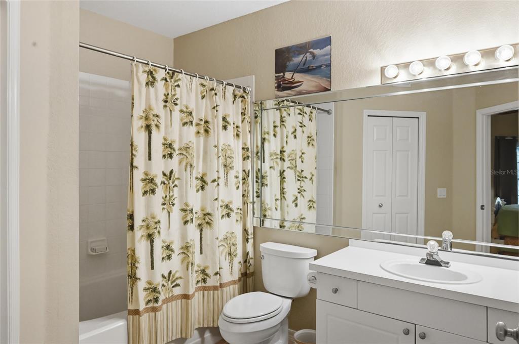 5122 Northridge Road, Unit 210 Sarasota, FL 34238 - Photo 17 of 36 a bathroom with a sink toilet and shower