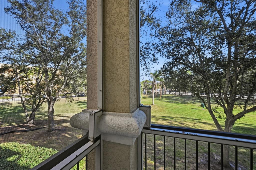 5122 Northridge Road, Unit 210 Sarasota, FL 34238 - Photo 25 of 36 a view of a garden from a balcony