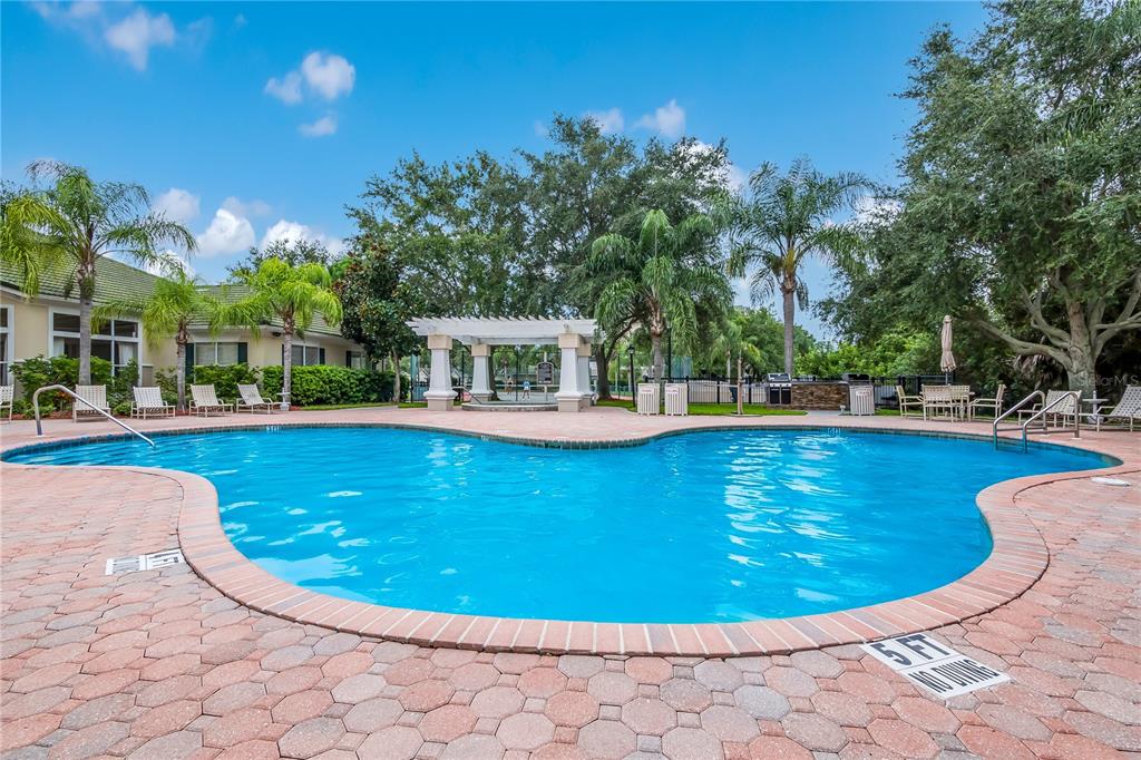 5122 Northridge Road, Unit 210 Sarasota, FL 34238 - Photo 29 of 36 a view of a swimming pool with outdoor space