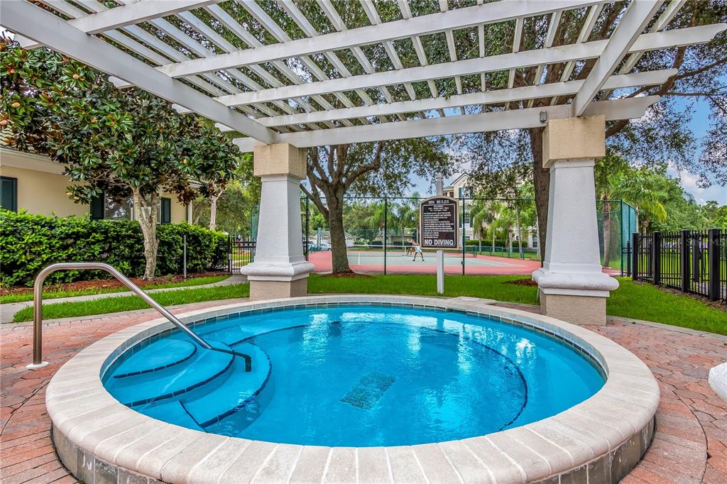 5122 Northridge Road, Unit 210 Sarasota, FL 34238 - Photo 30 of 36 a view of swimming pool with a backyard