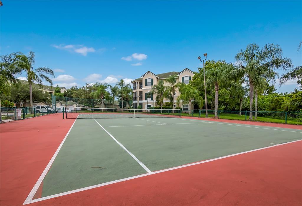 5122 Northridge Road, Unit 210 Sarasota, FL 34238 - Photo 31 of 36 a view of a tennis court
