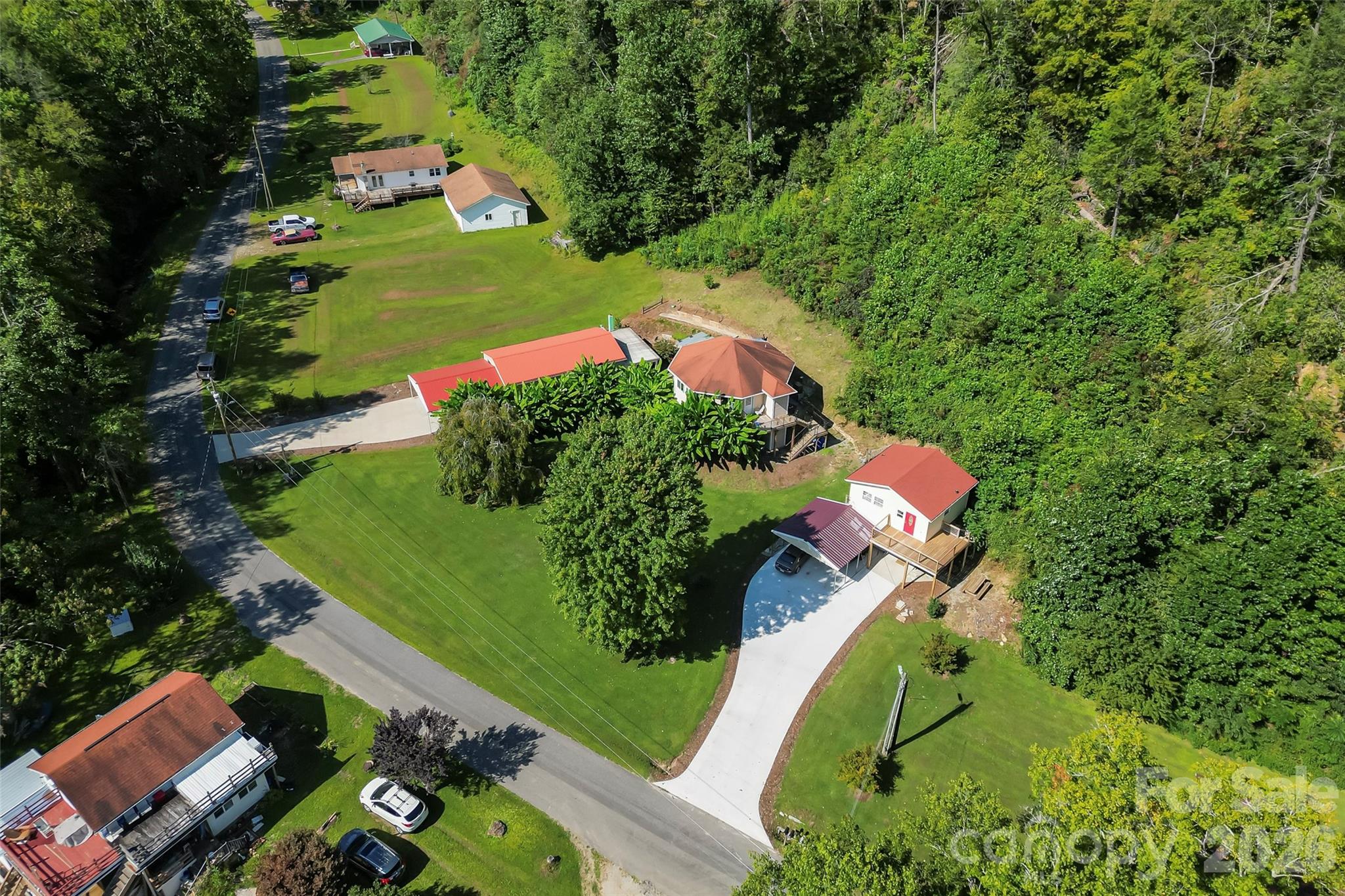 214 Locust Cove Road Marion, NC 28752 - Photo 13 of 47 an aerial view of a house