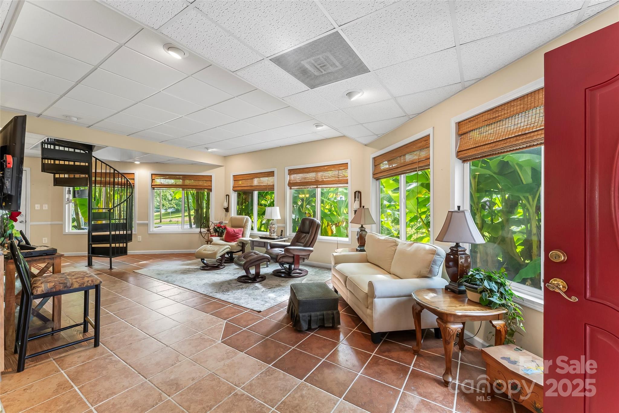 214 Locust Cove Road Marion, NC 28752 - Photo 20 of 47 a living room with furniture and large windows