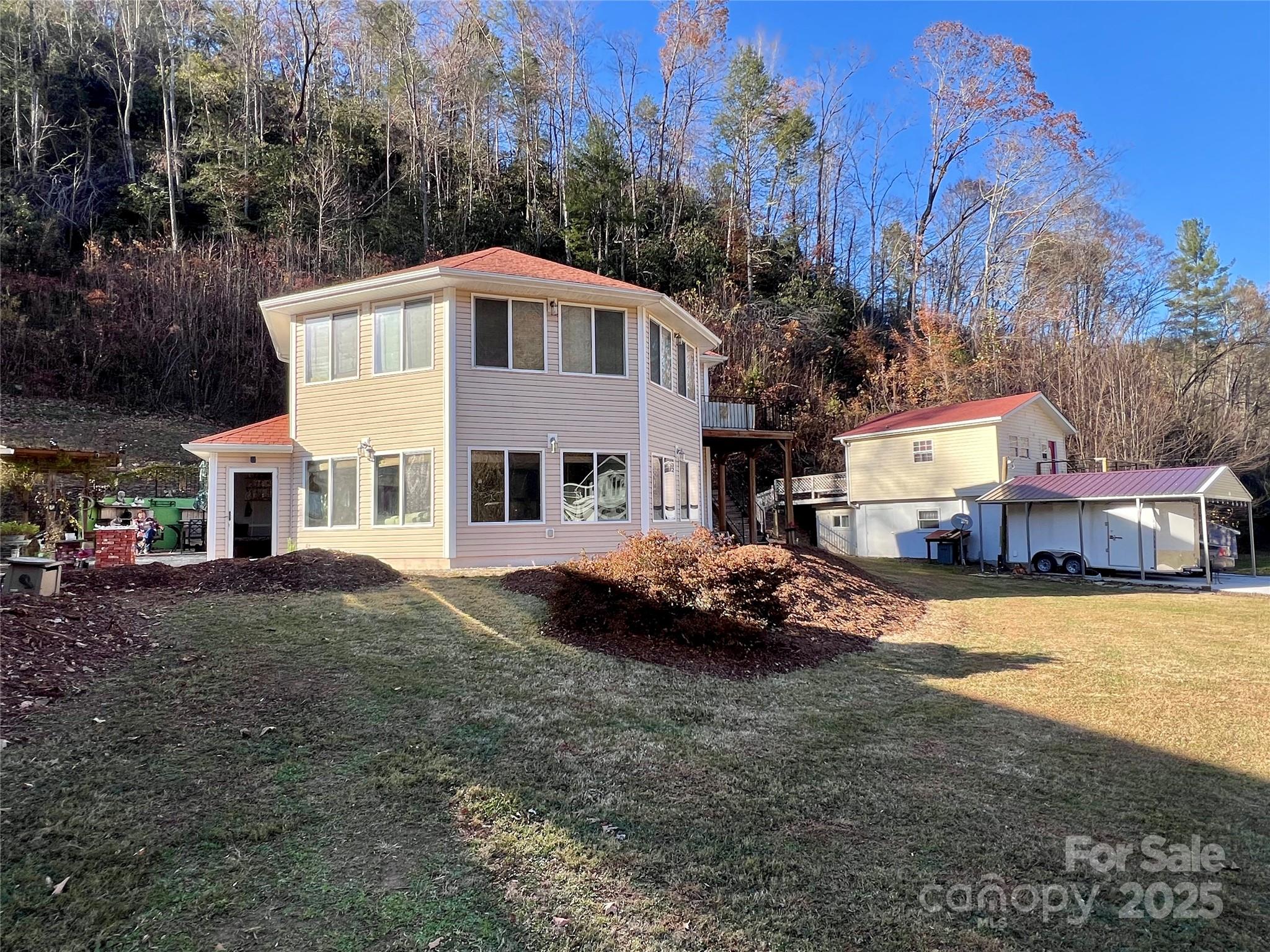 214 Locust Cove Road Marion, NC 28752 - Photo 2 of 47 a view of house and outdoor space